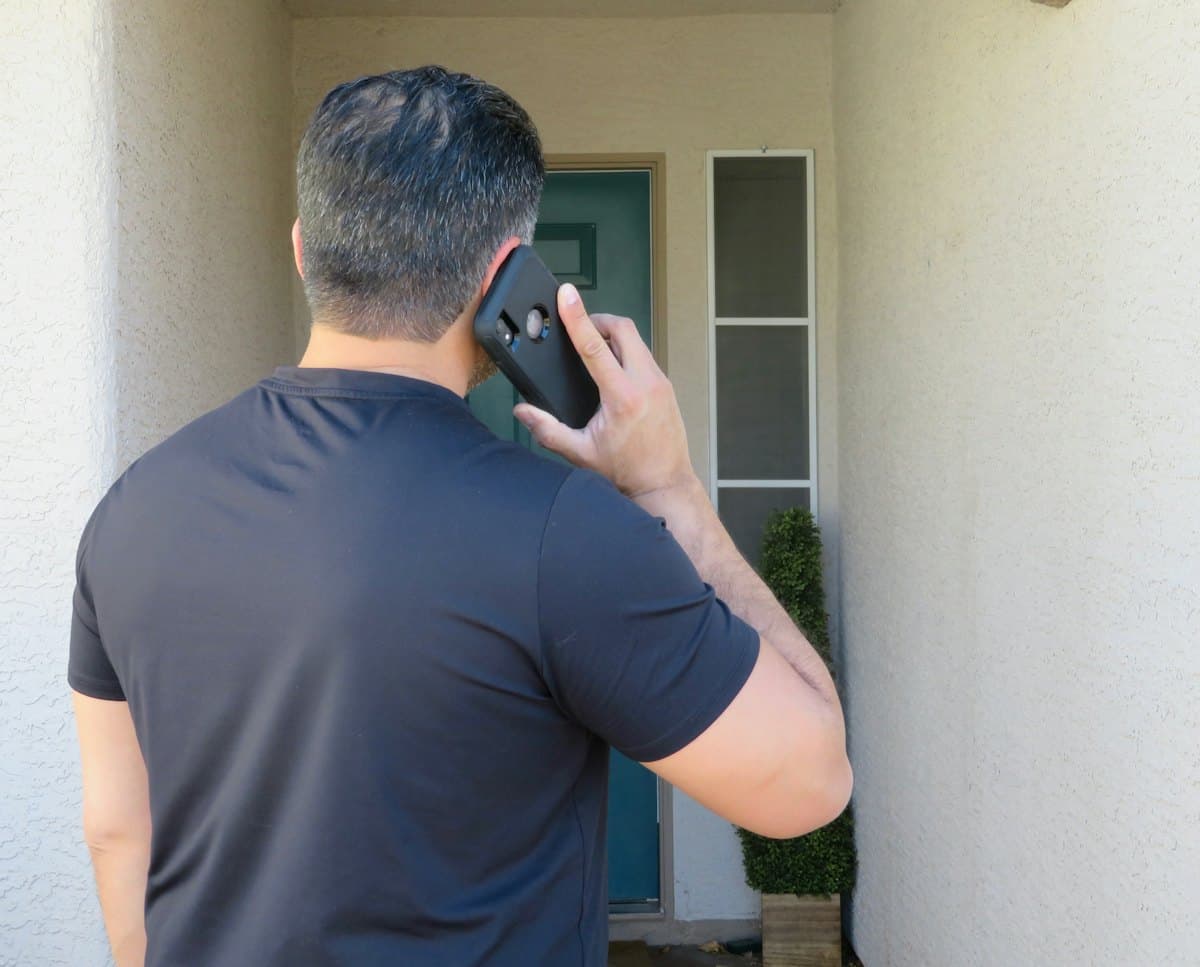 A homeowner calling a business